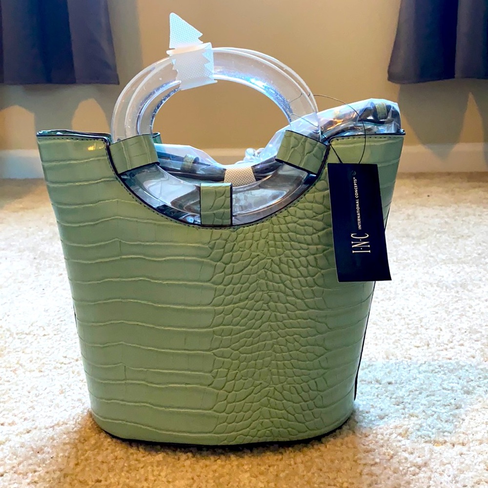 Brand new I.N.C mint croco bucket bag with clear handles and crossbody strap.